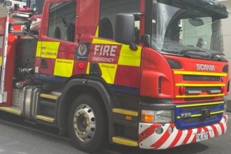 Man pulled from house fire in Sawyers Bay