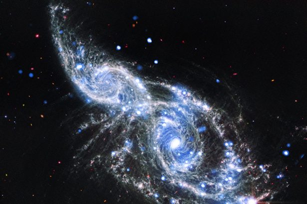 NASA Telescopes Capture Colliding Spiral Galaxies in Sparkling Detail