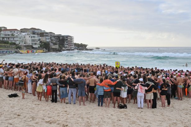 Suspected gunman in Bondi Beach shooting charged with 15 counts of murder : NPR