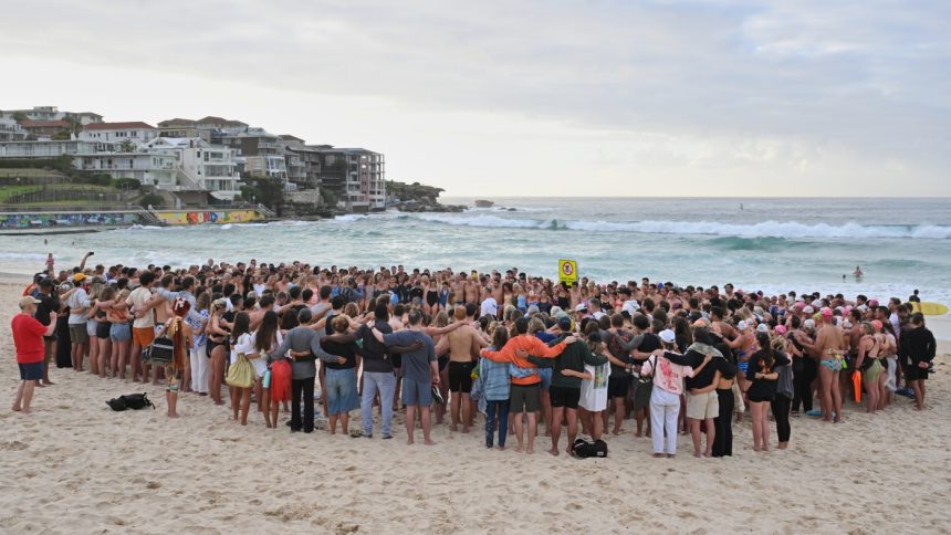Suspected gunman in Bondi Beach shooting charged with 15 counts of murder : NPR