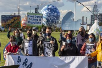 The Bad River Band is suing to protect its wild rice from an oil pipeline