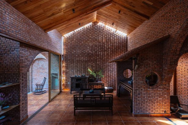 Trung Tran Studio Incorporates Mature Trees into a Warm Brick Home in Vietnam — Colossal