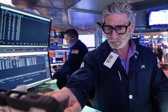 Wall Street pulls near its all-time high