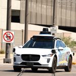 Waymo updating software after self-driving cars passed stopped school buses : NPR