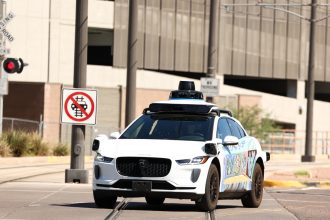 Waymo updating software after self-driving cars passed stopped school buses : NPR