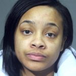 Woman shot boyfriend’s ex outside school, then fist-bumped him as victim lay dying: prosecutors