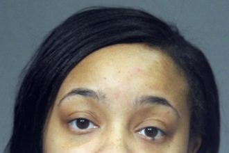 Woman shot boyfriend’s ex outside school, then fist-bumped him as victim lay dying: prosecutors