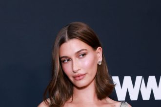 Hailey Bieber Enters Awards Season in Silvery Statuette Cosplay