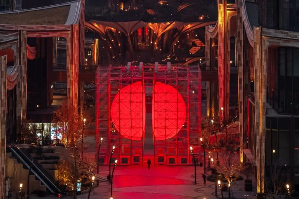 A Monumental Bisected Orb by SpY Glows Amid Scaffolding in Xi’an — Colossal