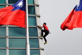 American Rock Climber Alex Honnold Reaches Top Of Taipei 101 Skyscraper Without Ropes