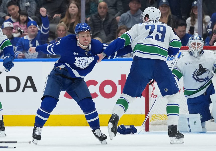 Fans react as 5-foot-10 Leafs forward dominates 6-foot-5 Canucks D-man in brawl