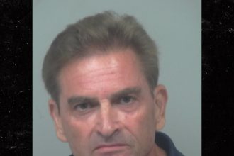 Georgia Man Arrested After Yelling Racial Slurs at Security Guard in Viral Video