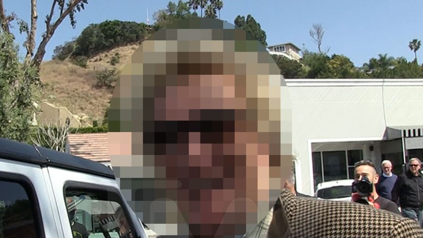 Guess Who This Proud Grandpa Is!