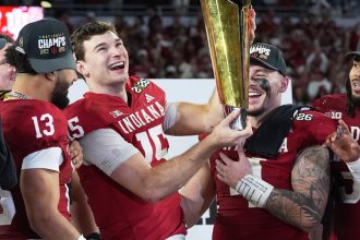 Indiana completes undefeated season and wins first national title, beating Miami : NPR