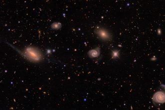 Largest galaxy survey yet confirms that the Universe is not clumpy enough