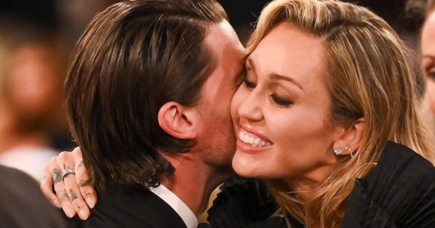 Miley Cyrus, Patrick Schwarzenegger Share Kiss on Cheek at Golden Globes