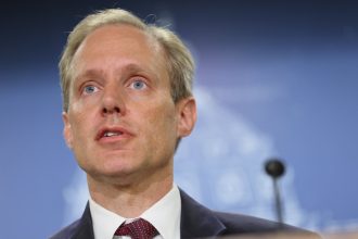 Minnesota rebuffs DOJ’s data demands after Pretti shooting : NPR