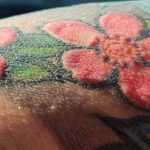 Red tattoo ink causes man to lose all his hair and stop sweating