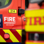 SH8 closed as truck rolls near Lawrence