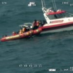 Stricken trio spend six hours in water clinging to lifejacket and bucket