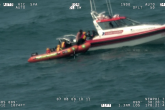 Stricken trio spend six hours in water clinging to lifejacket and bucket