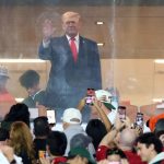Trump cheered by CFP national championship game crowd during national anthem at Indiana-Miami clash
