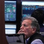 Wall Street ticks to records after shaking off worries about Trump’s feud with the Fed