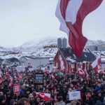 World markets jolted, euro softens, as Trump vows tariffs on Europe over Greenland