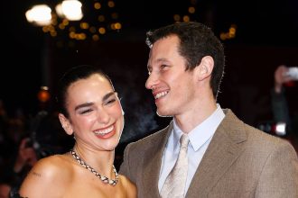 Dua Lipa and Callum Turner Take Opposite Couples Style to the Extreme in Berlin
