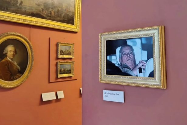 Activists Hang Prince Andrew’s Arrest Photo at the Louvre