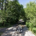 Body found on remote gravel road in area no longer covered by ShotSpotter