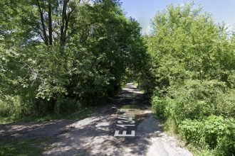 Body found on remote gravel road in area no longer covered by ShotSpotter