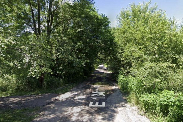Body found on remote gravel road in area no longer covered by ShotSpotter