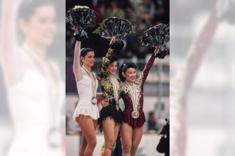 February 21, Figure skater Kristi Yamaguchi wins gold for the US