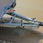 Fishtailing trailer hits ute and sends building materials flying