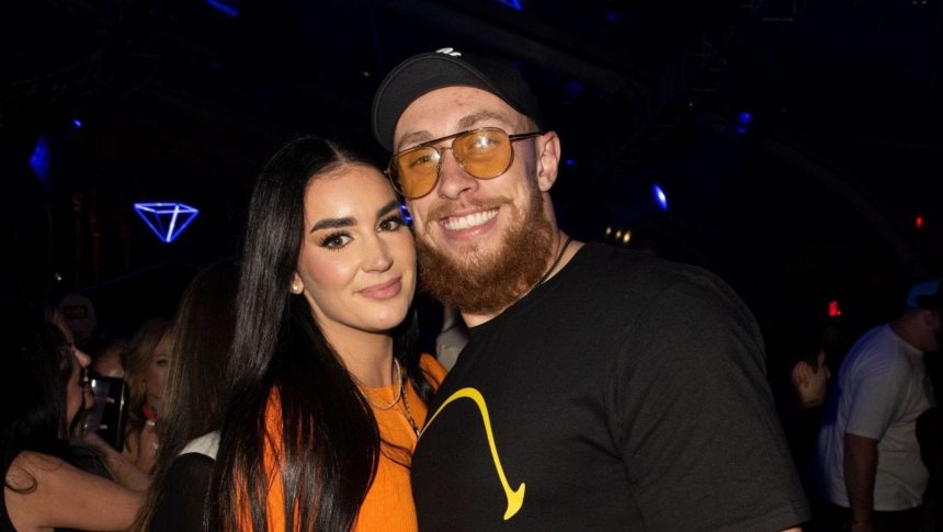 George Kittle swoons over wife Claire’s red swimsuit picture from Sports Illustrated photoshoot