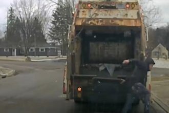 Sanitation Worker Finds Police Suspect Hiding In Trash Can