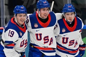 Team USA Hockey Rolls Past Latvia In Opening Game At Winter Olympics