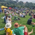 Thousands still attend festival after sewage spill