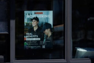 US labor costs growth cools in fourth quarter