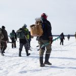 When the fish stop biting, ice fishers follow the crowd