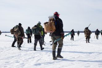 When the fish stop biting, ice fishers follow the crowd