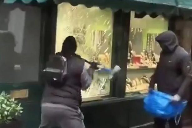Wild moment robbers smash jewelry store window on street made famous by ‘Ted Lasso’