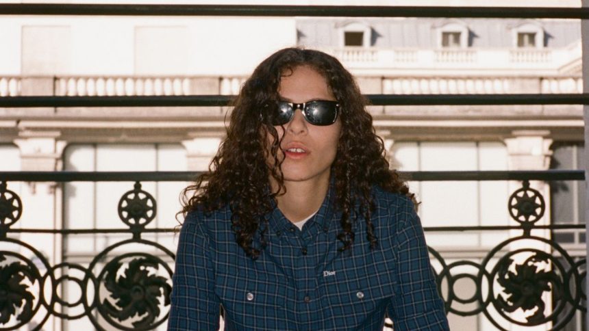 070 Shake Kept Her Wired Headphones on for the Dior Show