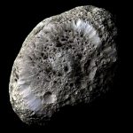 A Titan collision may link Saturn’s tilt, its moon Hyperion and its rings