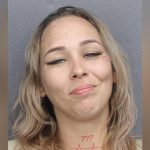 Florida woman grins in mugshot after shooting sister during fight