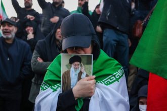 Iran hardliners cast slain supreme leader as martyr to rally regional allies