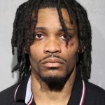 Parolee charged with trying to kill 4 Chicago cops