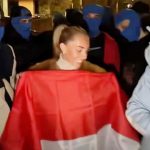 Porn star Bonnie Blue charged after mimicking sex act outside Indonesian embassy in UK