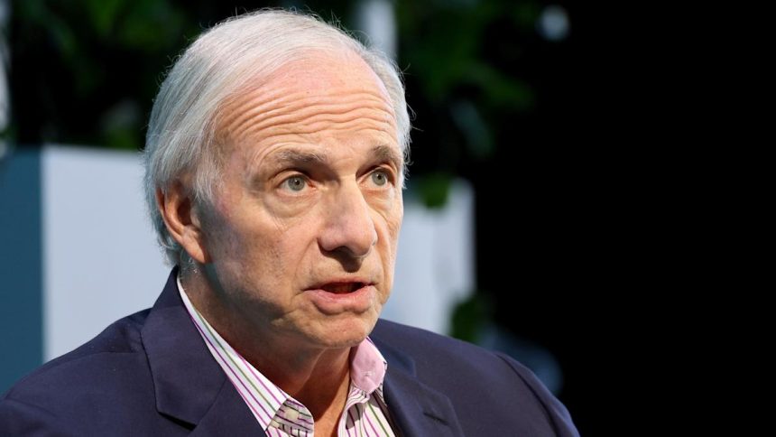 Ray Dalio says America is in a ‘debt death spiral’ and the war with Iran could make it worse. How to protect your assets